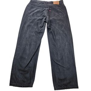 Vintage 99' Levis relaxed fit straight leg 38x30 black wash 553 BLANK TAB RARE -